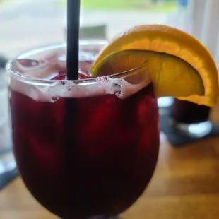 a drink with a slice of orange