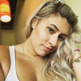 Mandi E.