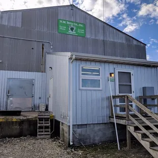 Outside.  Go into the office to buy oysters and clams