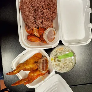 two takeout containers with rice, chicken wings, carrots, and coleslaw