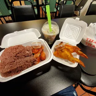 two takeout containers of food