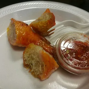 Deboned and stuffed with rice noodles chicken wings, and housemade hot sauce.