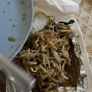 A plate full of bean sprouts in the so called house chop suey!! Rip off!!!