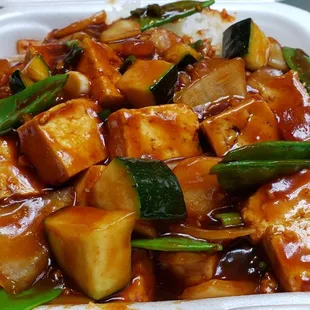 Hot &amp; spicy tofu ($10). Tangy and spicy. Tofu wasn't fried, but was still good.