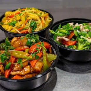 Front- pineapple chicken, right - moo goo gai pan, back- Singapore chicken noodle