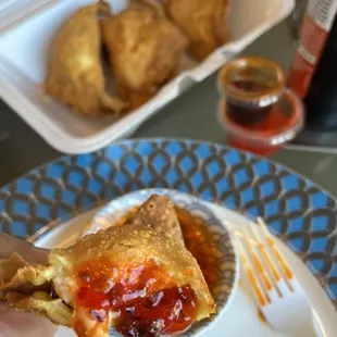 Hmmm, with chili oil and sweet and sour sauce