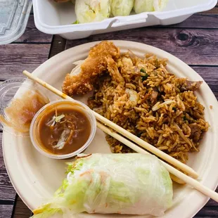 Combo fried rice , Vietnamese Vegetable Egg Roll, and garlic chicken wing!