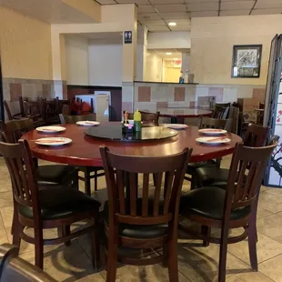 a table and chairs in a restaurant