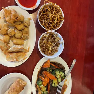 Sweet and sour pork, egg roll, beef and broccoli, lomein, fried rice, and fried dumpling