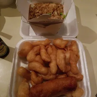Sweet and sour chicken , shrimp fried rice and shrimp eggroll