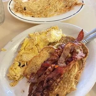 French toast, bacon, begs, hash browns