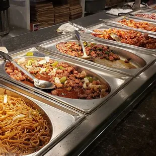 a buffet with many different types of food