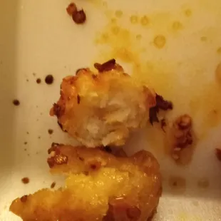 This is sesame breading, no chicken, none in the scoop and a half they sold me.