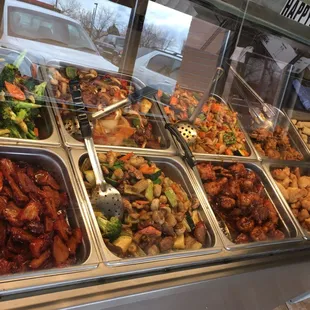 a variety of food items in a display case
