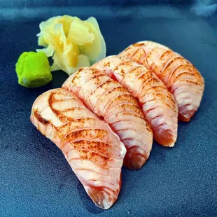 Seared salmon nigiri  IG: @fooddeclassified