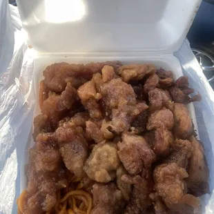 $10, Two item Orange Chicken and Teriyaki.  Buried under there is some chow mein.  I ain&apos;t taking video, this is what they do!