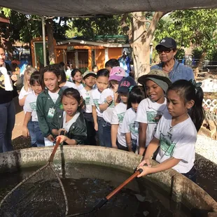 Students enjoying the fish.