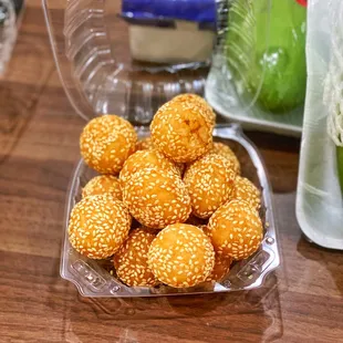 a bowl of sesame balls