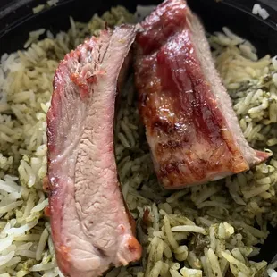 two pieces of meat and rice