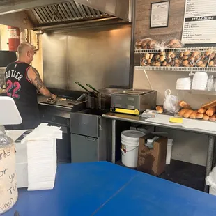 a man working in a kitchen