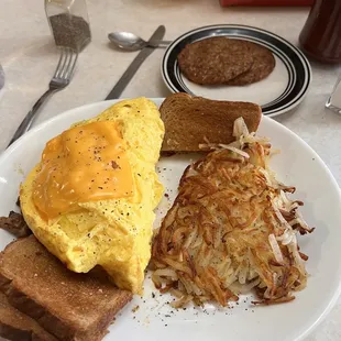Omelette w/ hash browns.