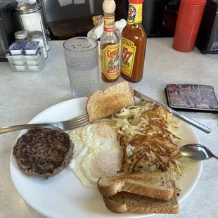 #7 1/3 lb beef patty cooked medium-rare, eggs over easy, wheat toast, hash browns (+$3.50). deadpool wallet not included lol