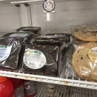 a shelf full of cookies and cookies