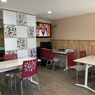 tables and chairs in a coffee shop