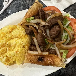 9.Com chiên bô lúc lác. House fried rice with filet mignon chunk steak.