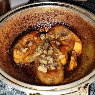 Fish simmer in fish sauce in hot pot