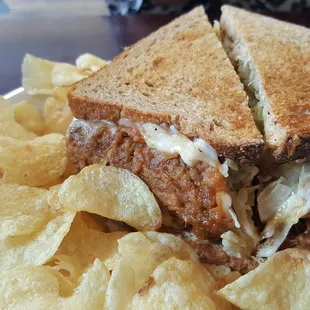 Pulled pork sandwich. Juicy pork with crunchy slaw. Look at that portion!