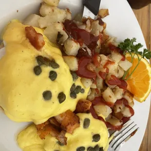 Salmon Bennie Hash browns on the side