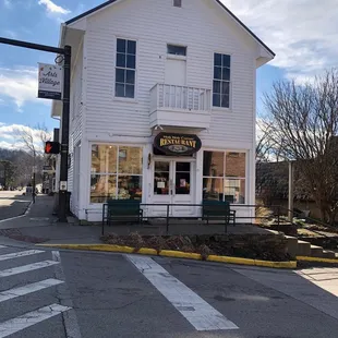 a white building on a street corner
