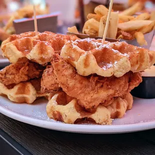 Chicken &amp; Waffle Sliders. Buttermilk fried chicken, whipped butter, chipotle maple syrup, fries. $16.50.