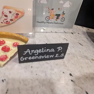 a slice of pizza on a table