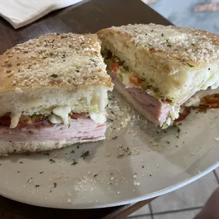 REAL Half muffaletta with fries.