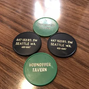 four coasters on a table