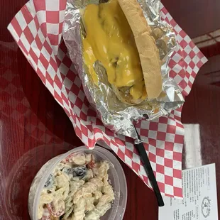 Oooey Gooey cheeseburger with past salad