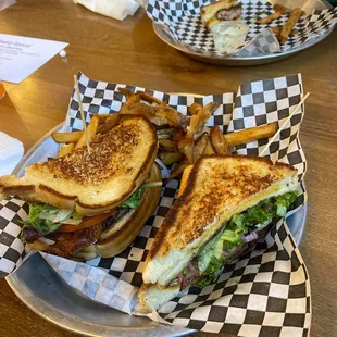 T money with all the "fixin's" and fries.