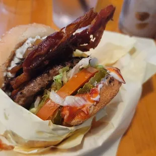 The blue Jay burger,  1/3 lb pattie, grilled onions,  and all the fixings. Bacon was extra but a generous portion.