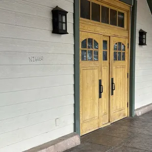 graffiti on the door of the liberty hall