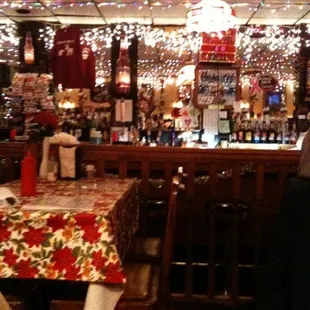a bar with christmas lights