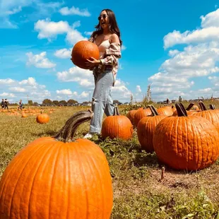 Me carrying a pumpkin