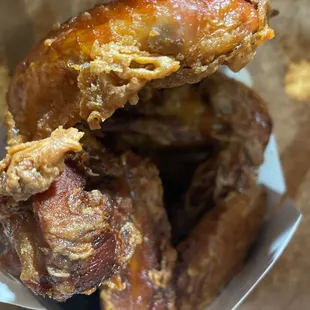 Burnt chicken.. couldn&apos;t even pull the wings apart.