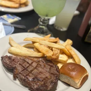 steak and fries on a plate