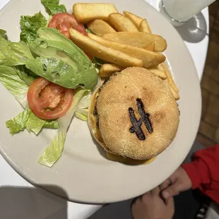 Their signature 1/2 lb. Hamburger Steak Lunch Special! Branded with their Initial.
