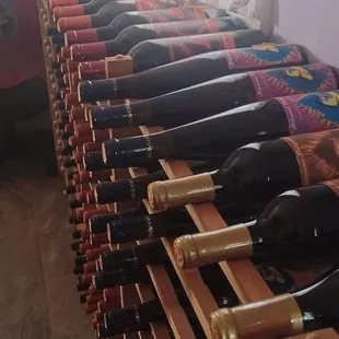 a long row of wine bottles