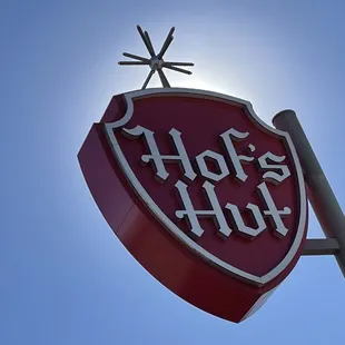 a red and white sign