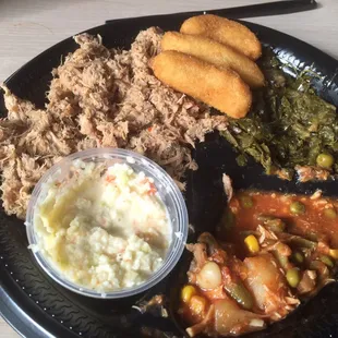 Large BarBQ plate with slaw, Brunswick stew, collars and hush puppies
