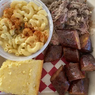 Pulled pork, sausage, corn bread and mac and cheese.